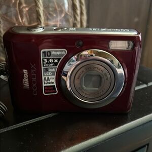 Nikon Red Digital Camera with Sleek Design and Zoom